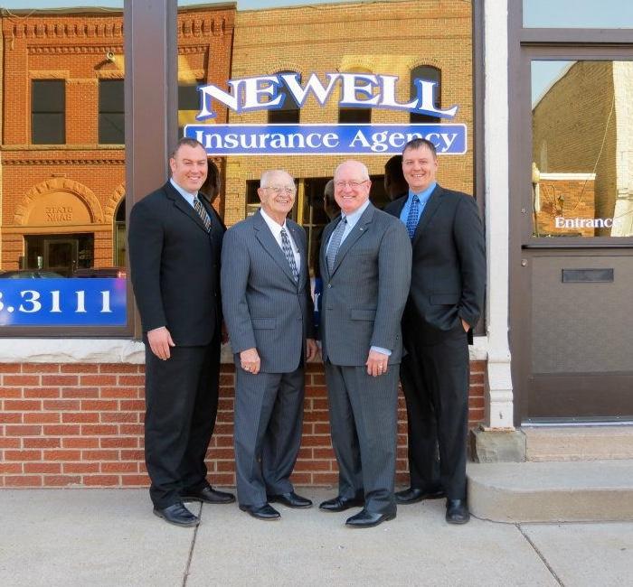 Family home and vehicle representing the everyday coverage Newell Insurance Agency protects