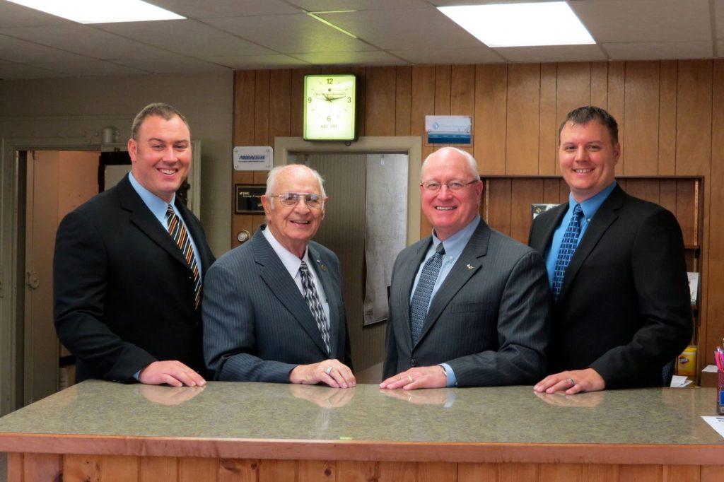 Oscar, Terry, Brad, and Jay Newell — three generations of the Newell family